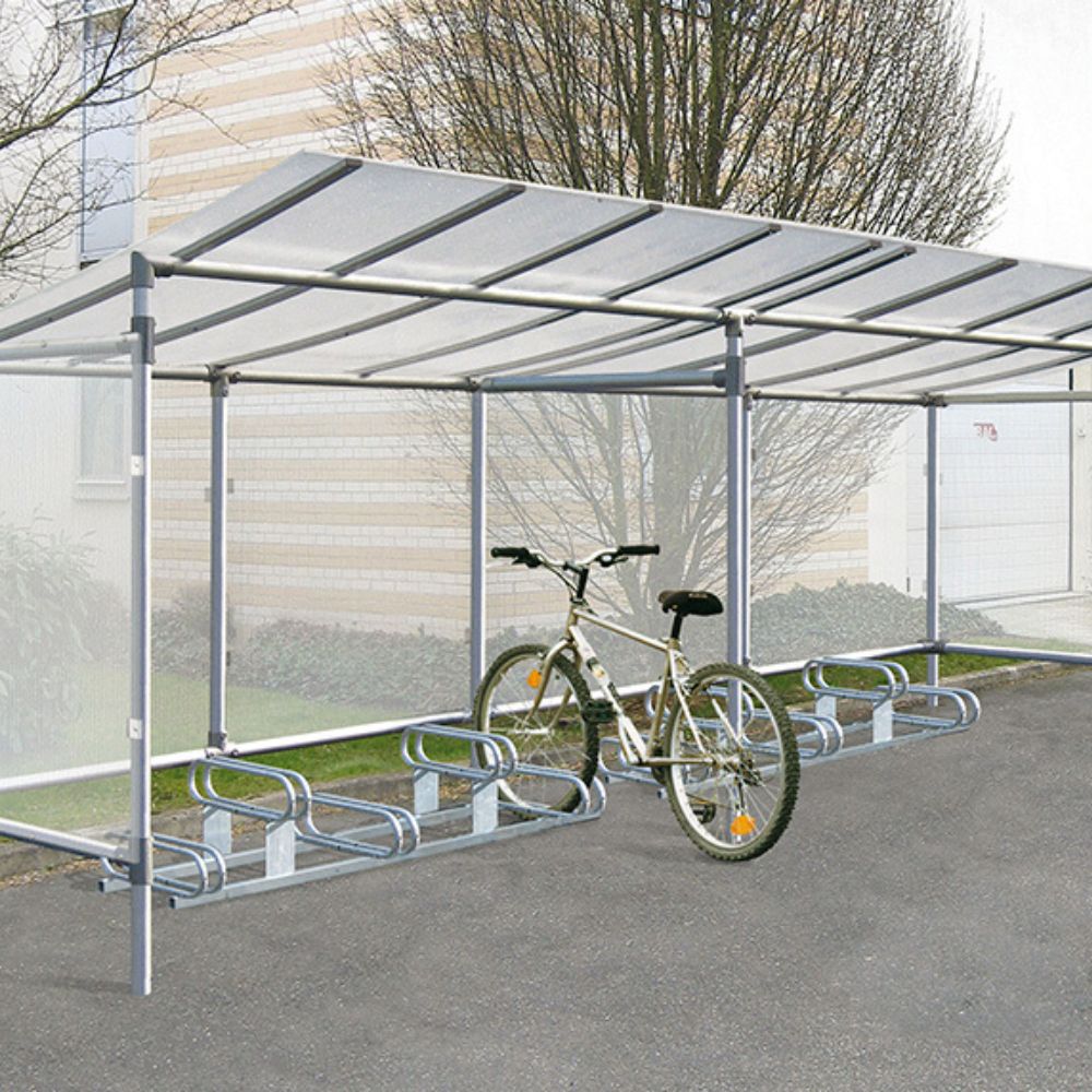 Cykelgarage med två fristående cykelställ. En MTB står i cykelstället.